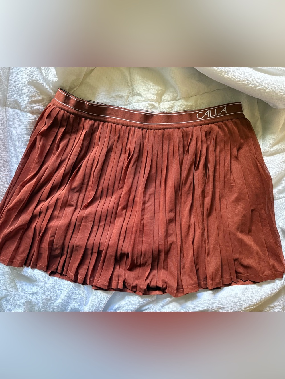 Calia Pleated Mini Skort in Rust Brown/orange